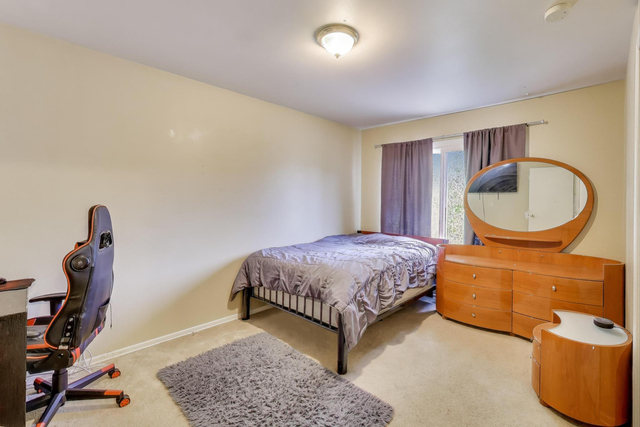 257 Bryant Way Bolingbrook, IL 60440 - Photo 12 of 20 a bedroom with a bed and glass door