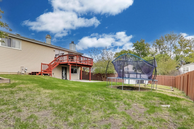 257 Bryant Way Bolingbrook, IL 60440 - Photo 18 of 20 a house view with a sitting space and garden