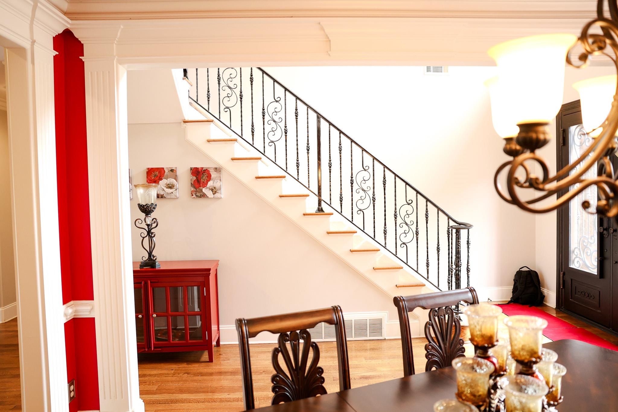 649 Ridge Springs Road Collierville, TN 38017 - Photo 10 of 35 Foyer with stairway and light wood-style floors