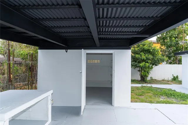 a view of backyard with green space