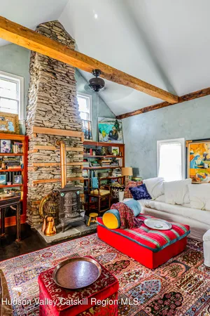 a view of a chairs and table in a room