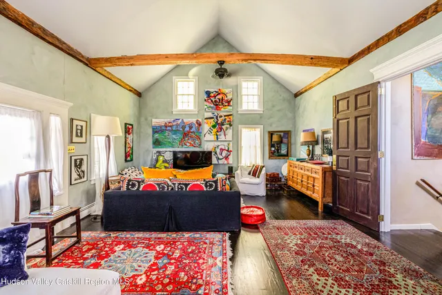 a view of a chairs and table in a patio