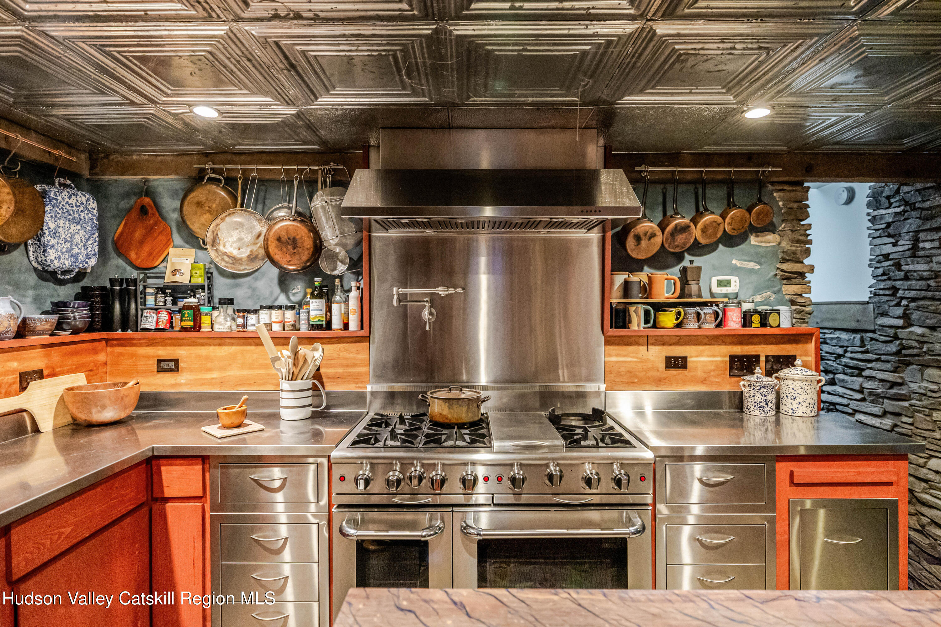 1 Wittenberg Road Bearsville, NY 12409 - Photo 22 of 72 a stove top oven sitting inside of a kitchen