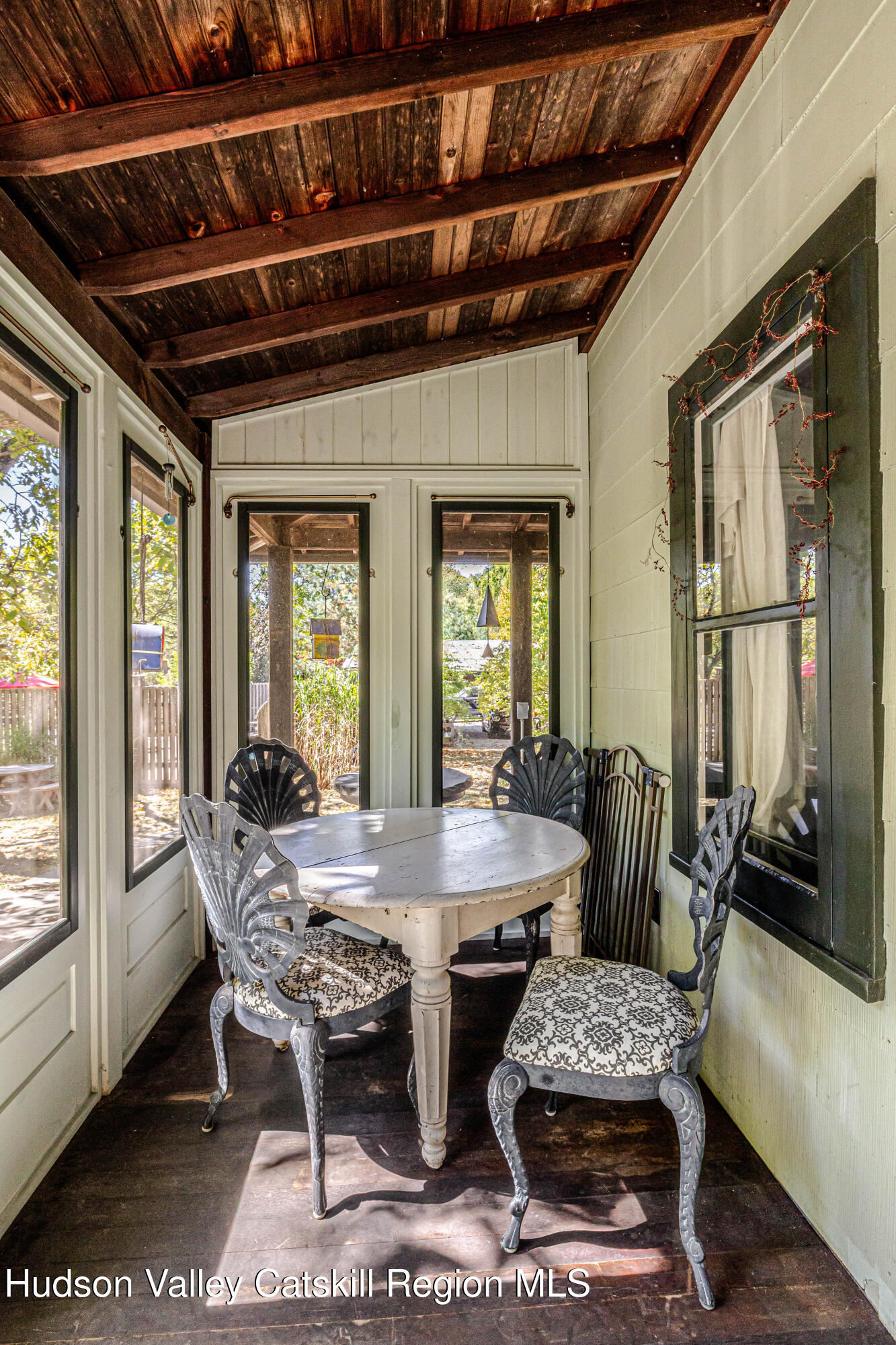 1 Wittenberg Road Bearsville, NY 12409 - Photo 26 of 72 a dining room with furniture and a floor to ceiling window