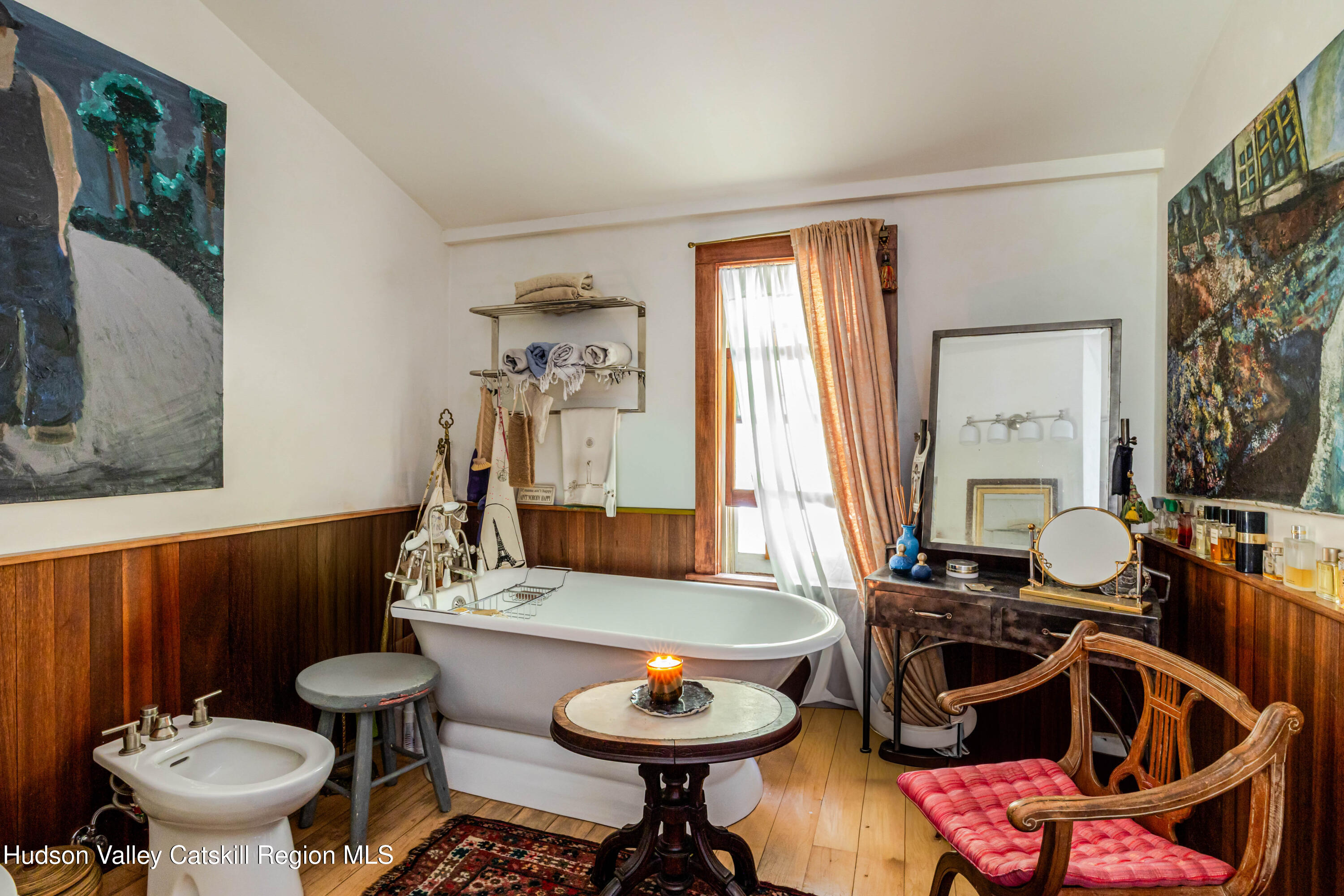 1 Wittenberg Road Bearsville, NY 12409 - Photo 33 of 72 a living room with furniture a rug and a lamp