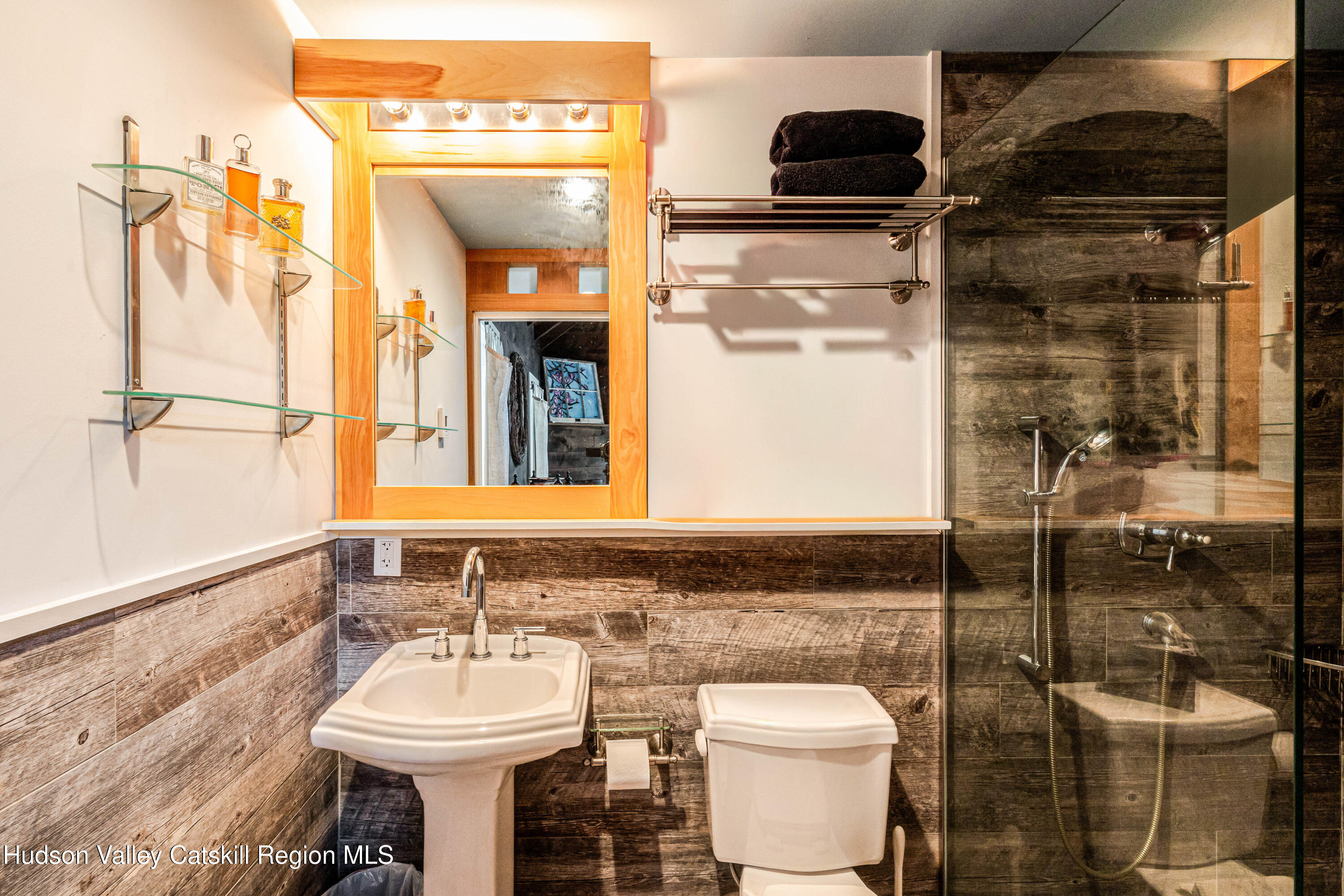 1 Wittenberg Road Bearsville, NY 12409 - Photo 41 of 72 a bathroom with a toilet sink and mirror