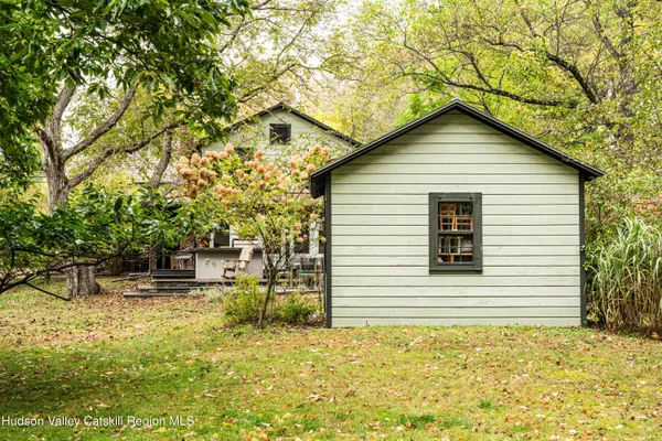 a view of a yard with trees
