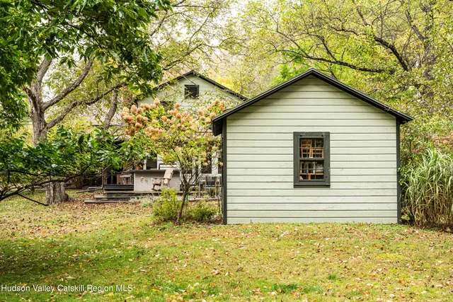 a view of a yard with trees