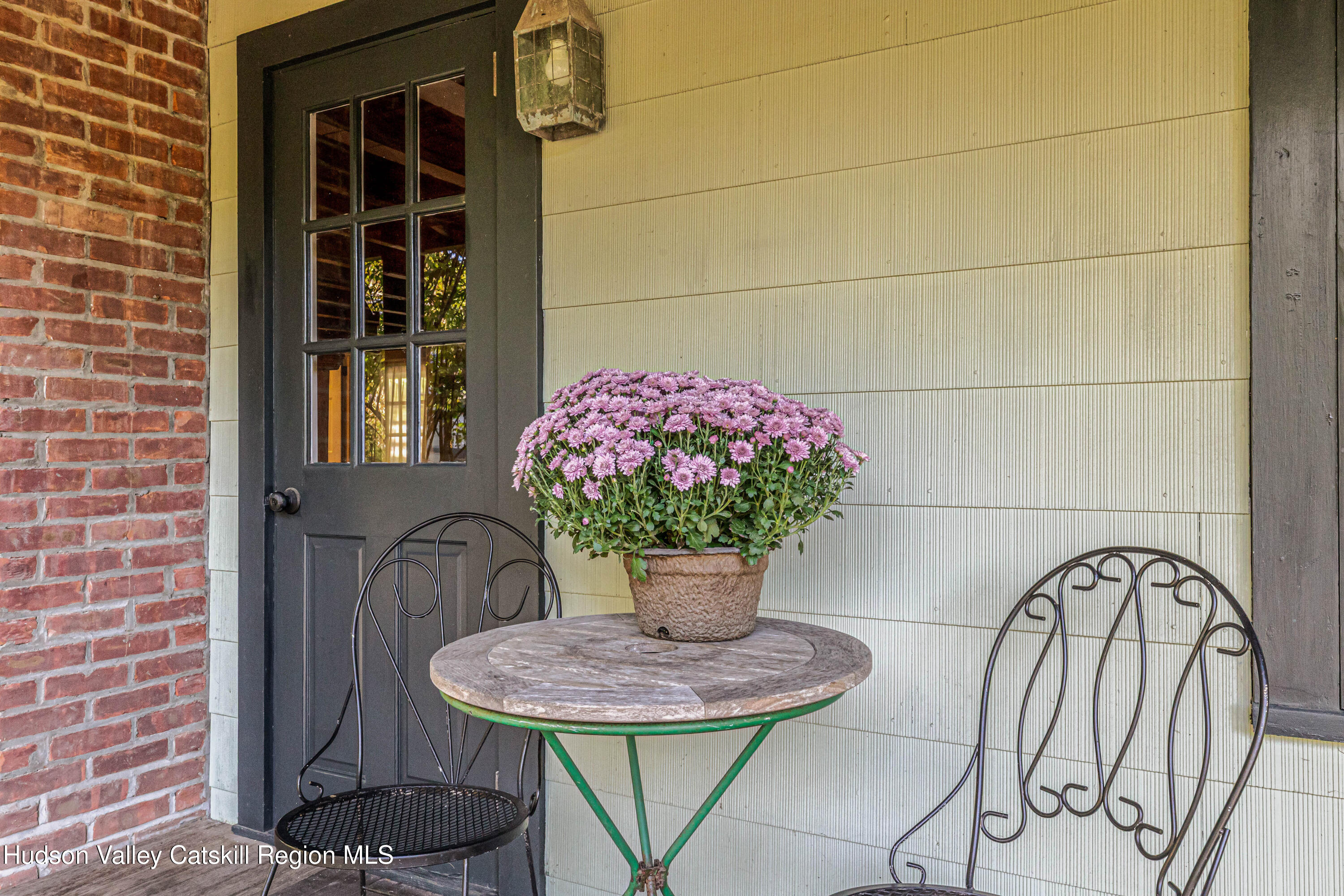 1 Wittenberg Road Bearsville, NY 12409 - Photo 64 of 72 a view of a dining room with furniture and a potted plant
