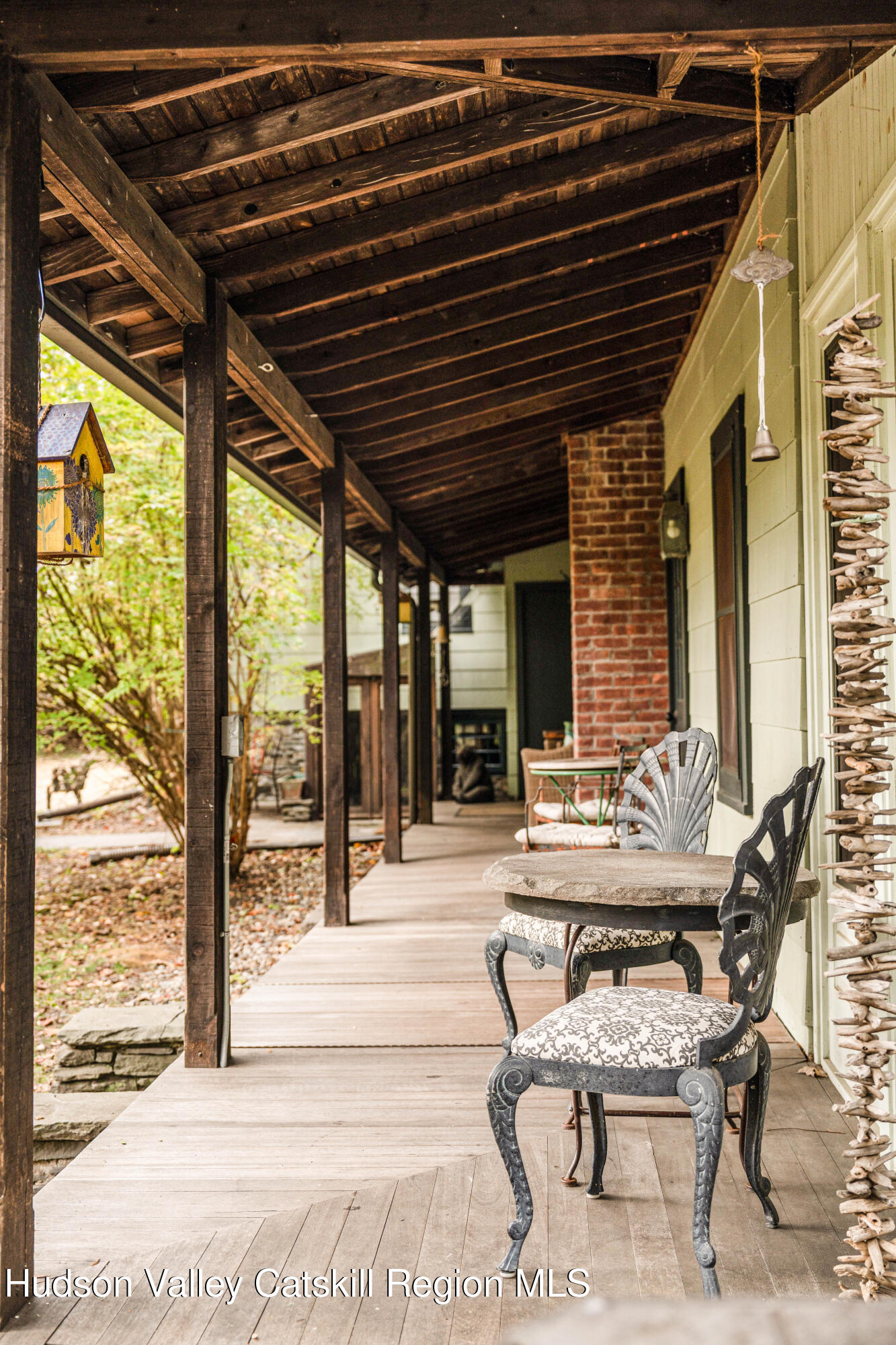 1 Wittenberg Road Bearsville, NY 12409 - Photo 8 of 72 a patio with patio lots of furniture and wooden floor