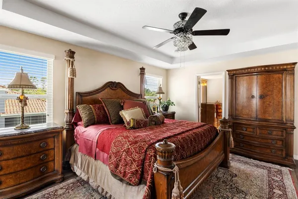 a bedroom with a bed and a closet