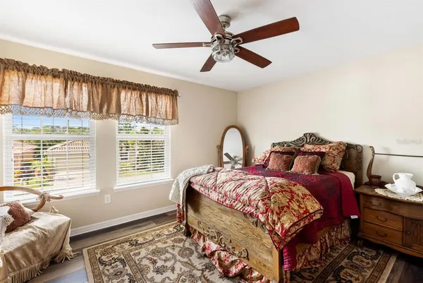 a bedroom with bed and a window
