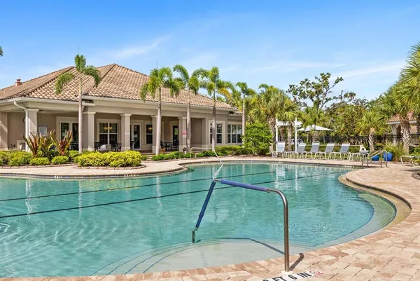 a view of a house with swimming pool