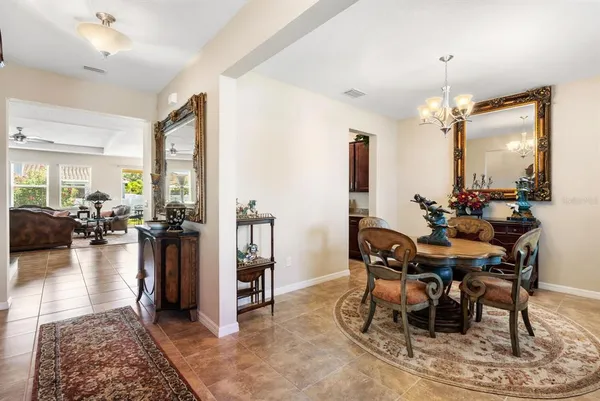 a view of a dining room with furniture