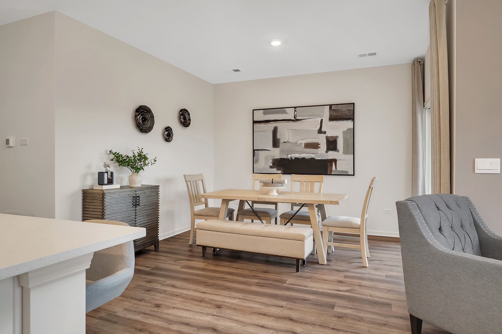 1124 Bluebell Lane Bartlett, IL 60103 - Photo 13 of 16 a living room with furniture and a potted plant