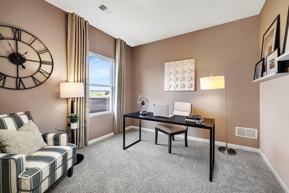 1124 Bluebell Lane Bartlett, IL 60103 - Photo 5 of 16 a work room with furniture and a window