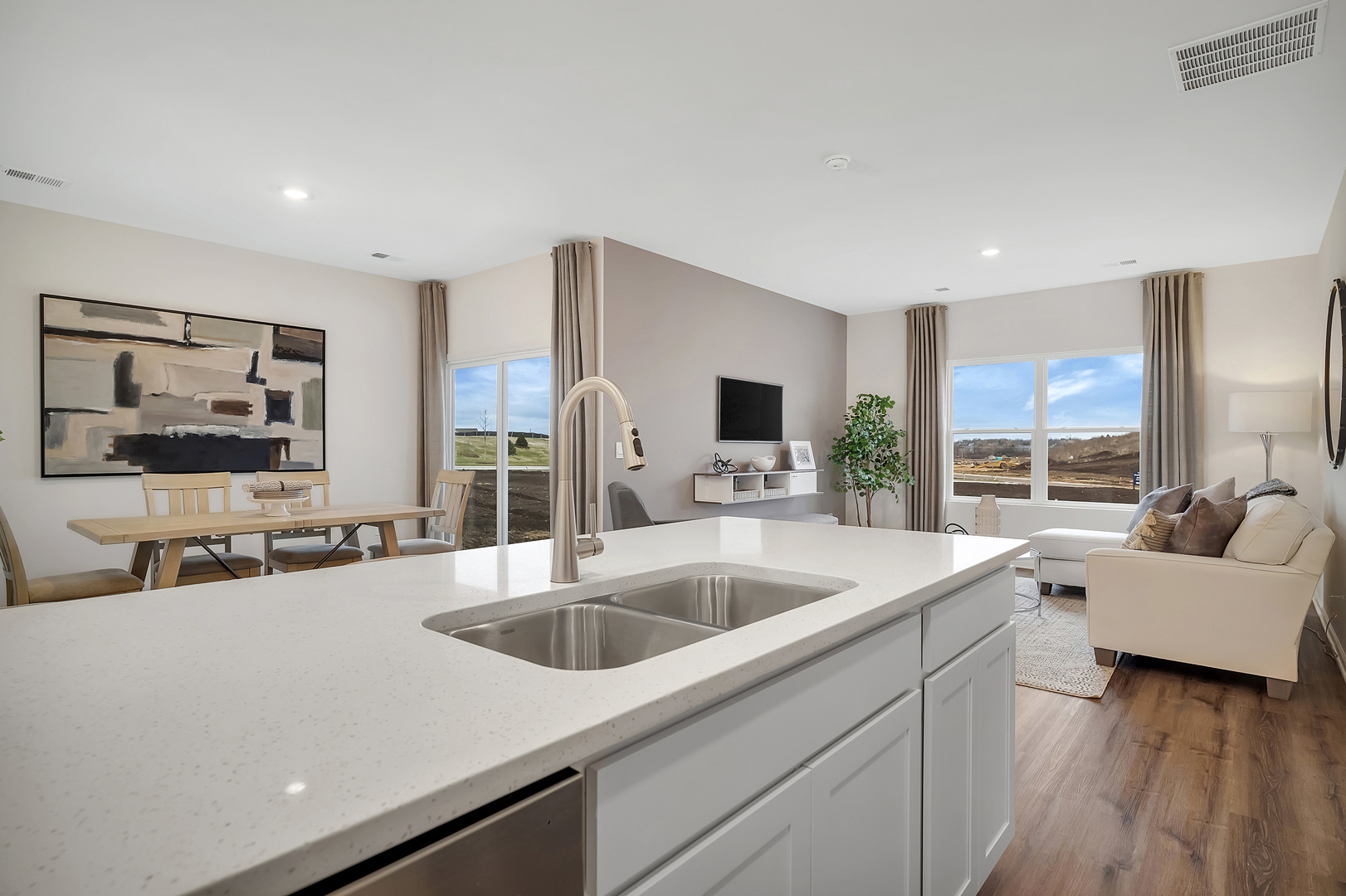 1124 Bluebell Lane Bartlett, IL 60103 - Photo 10 of 16 a view of kitchen island a sink and living room