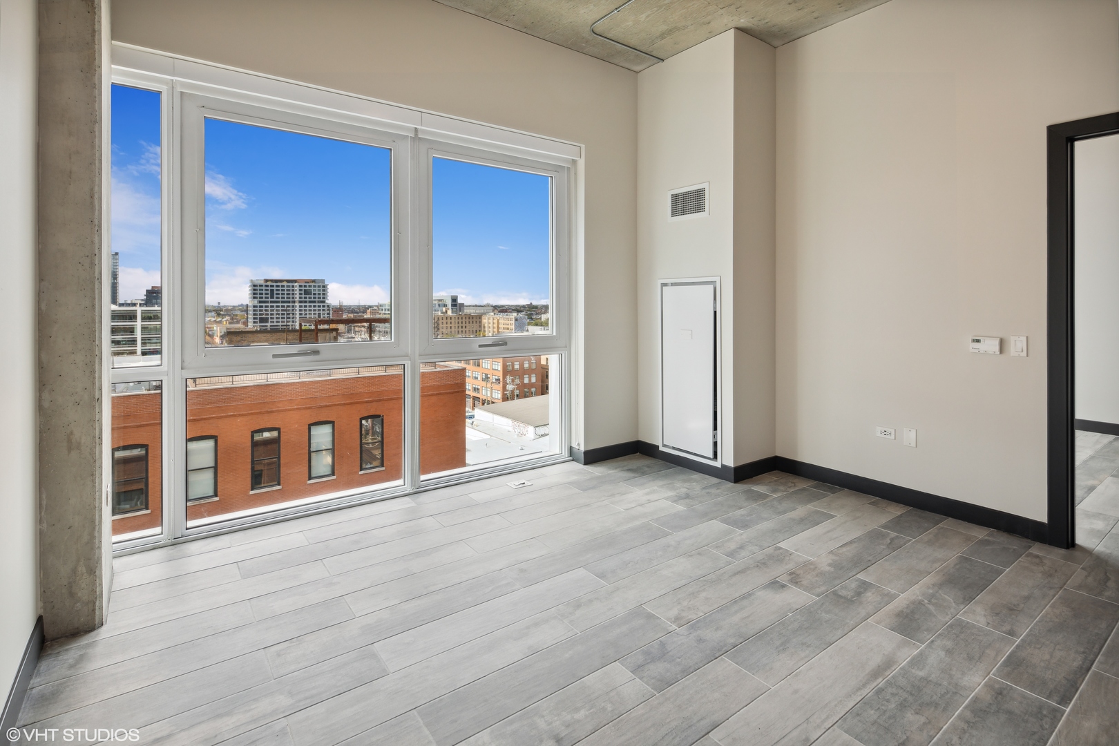 171 North Aberdeen Street, Unit 903 Chicago, IL 60607 - Photo 4 of 20 a view of a kitchen with stainless steel appliances granite countertop a stove and a refrigerator