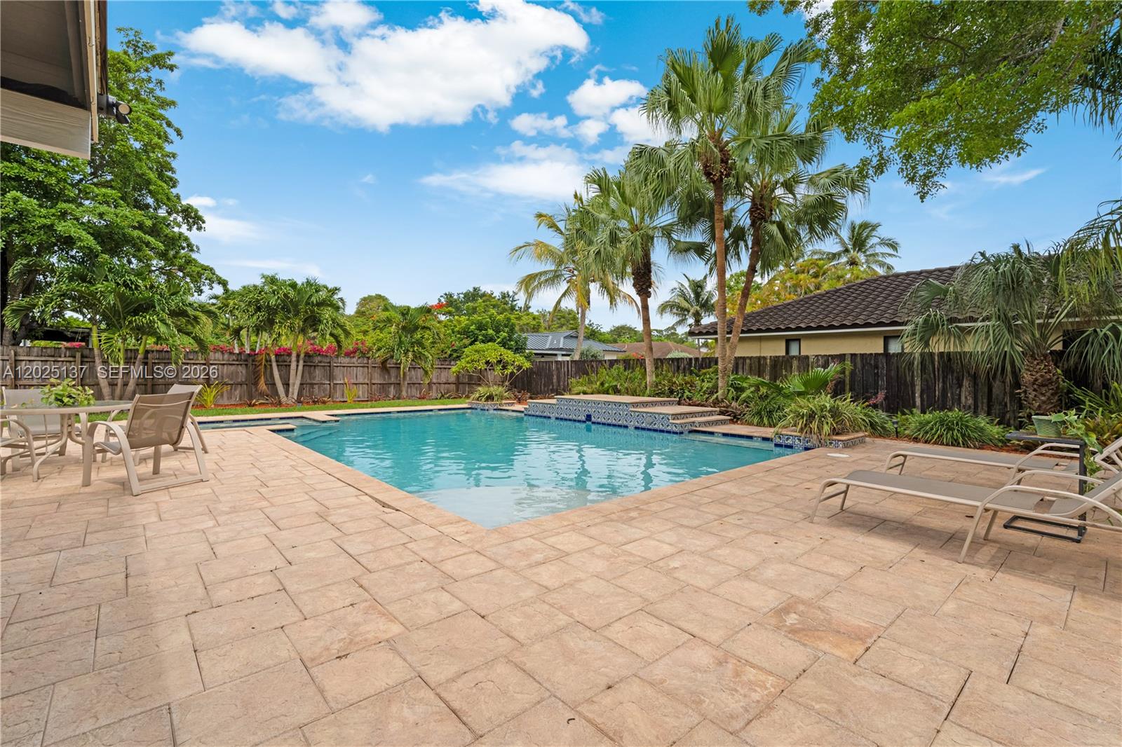 11480 Southwest 96th Terrace Miami, FL 33176 - Photo 51 of 54 a view of a swimming pool with a patio