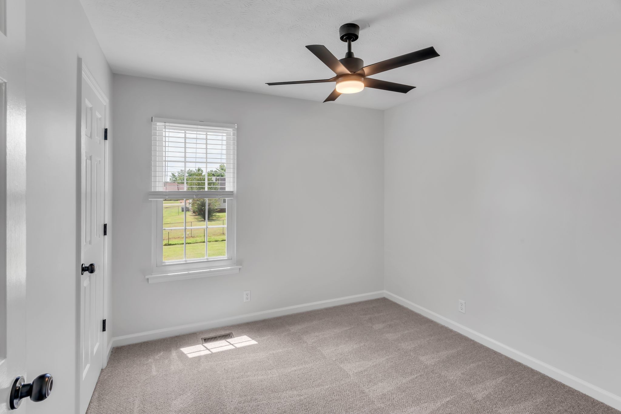 6053 Ebenezer Road Greenbrier, TN 37073 - Photo 15 of 28 an empty room with window and closet
