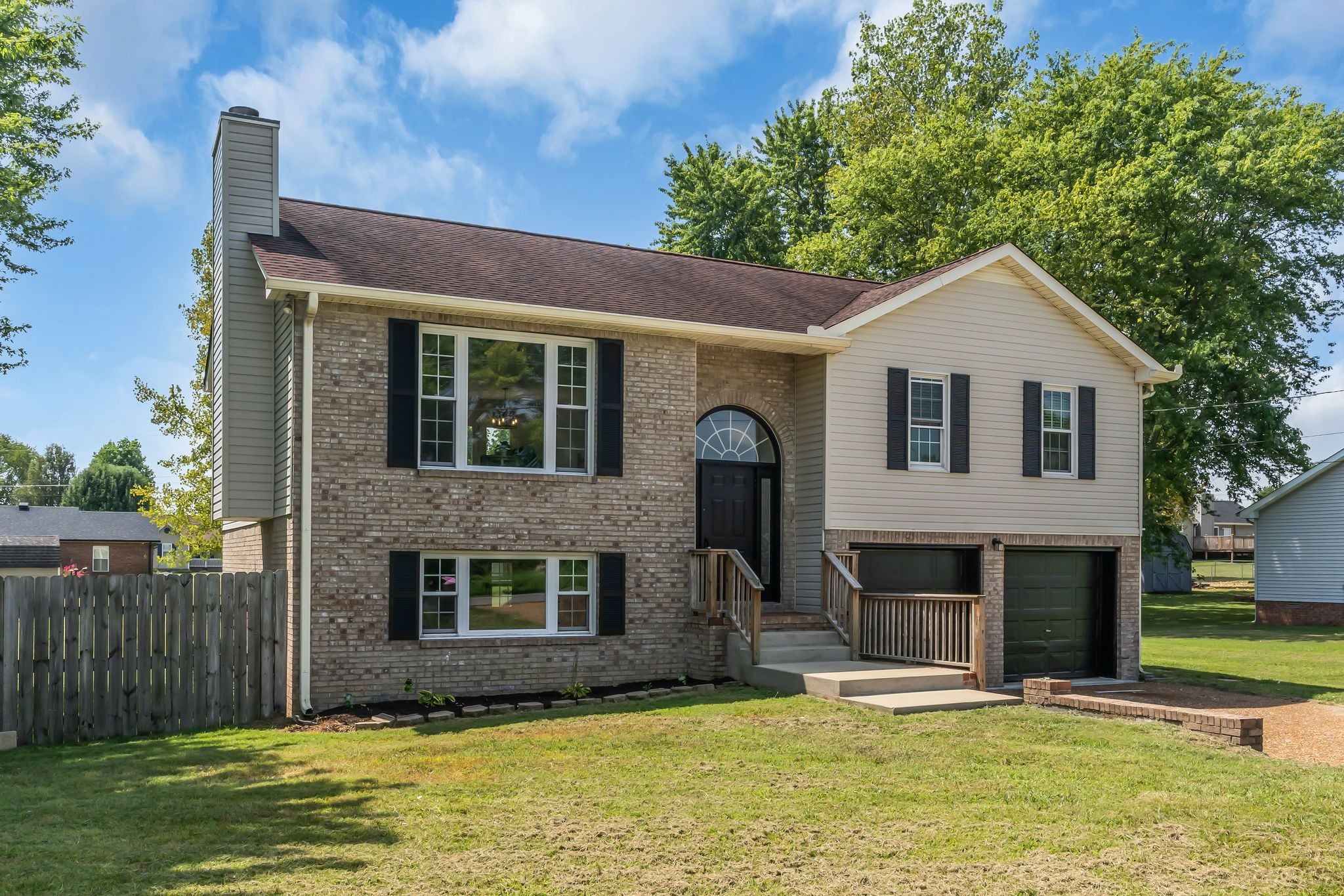 6053 Ebenezer Road Greenbrier, TN 37073 - Photo 2 of 28 a front view of a house with a yard