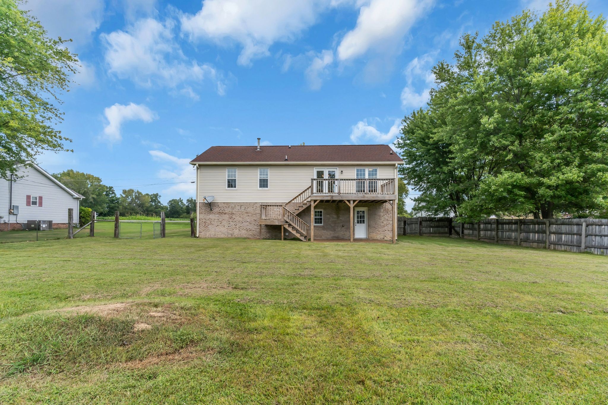 6053 Ebenezer Road Greenbrier, TN 37073 - Photo 24 of 28 a backyard of a house with lots of green space