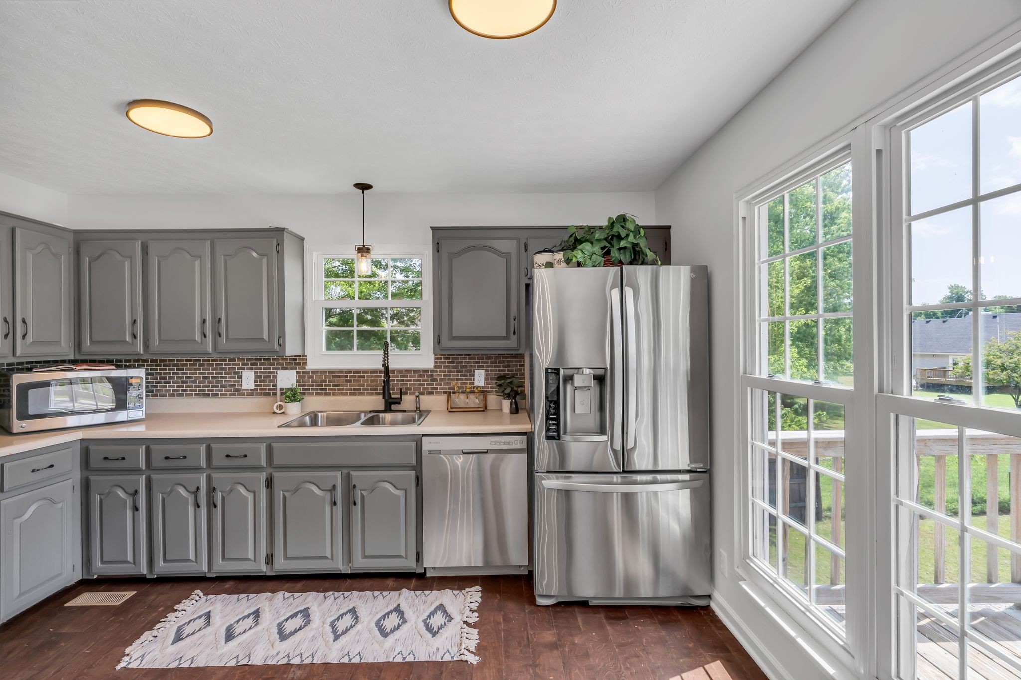 6053 Ebenezer Road Greenbrier, TN 37073 - Photo 10 of 28 a kitchen with a sink refrigerator and window