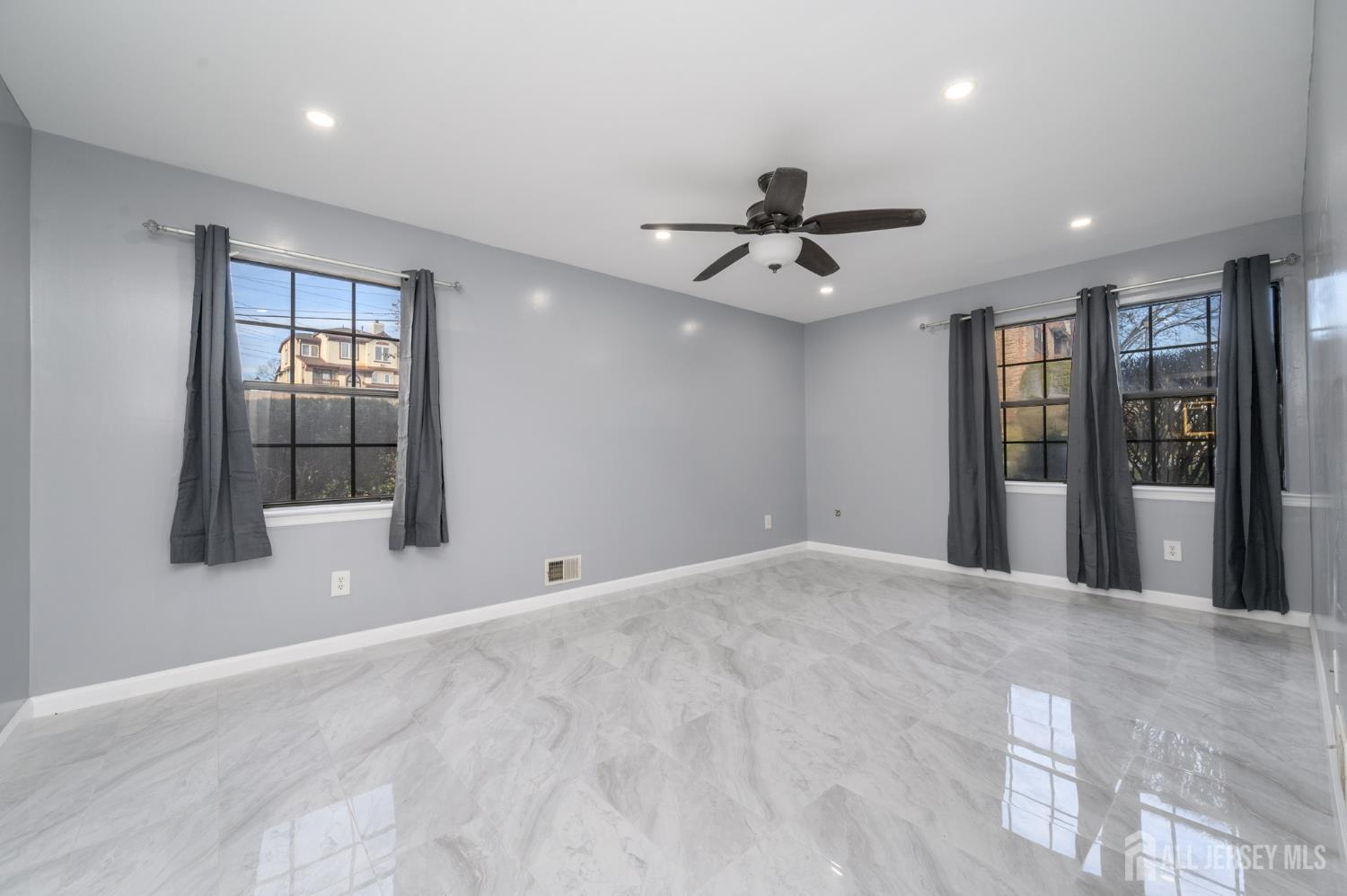 28 Powderhorn Court, Unit A Woodbridge, NJ 07095 - Photo 14 of 26 a view of an empty room with a window