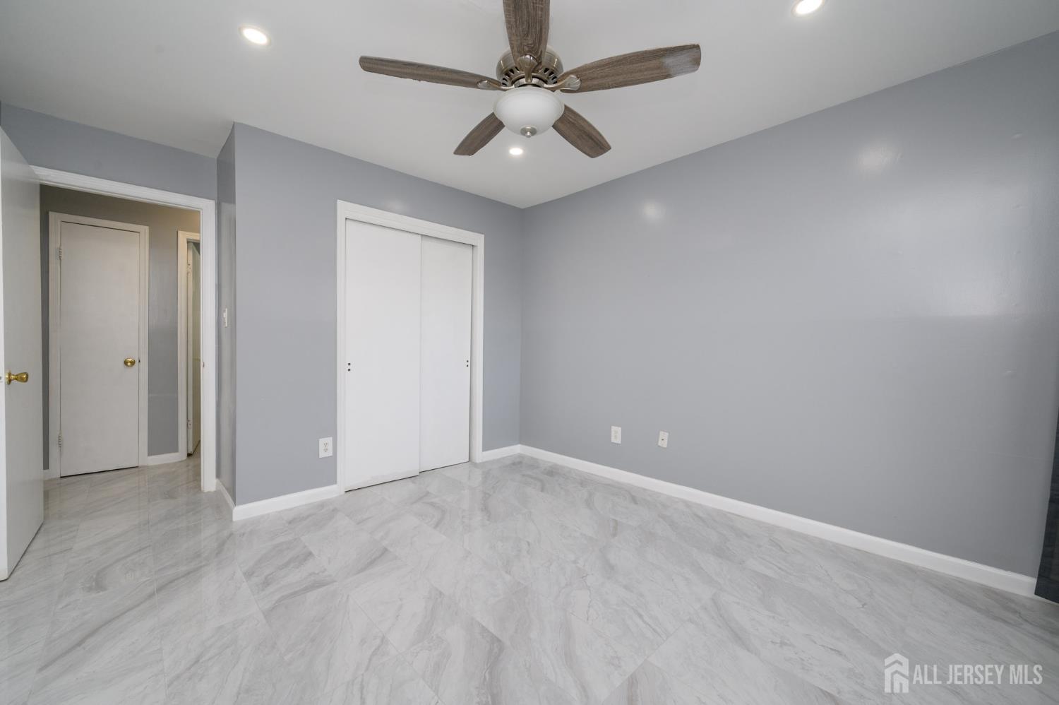 28 Powderhorn Court, Unit A Woodbridge, NJ 07095 - Photo 20 of 26 wooden floor in an empty room
