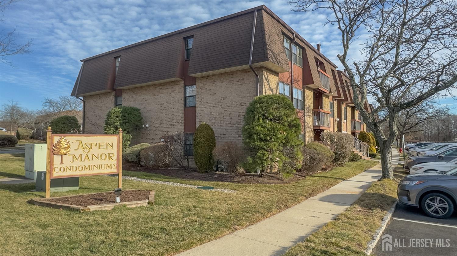 28 Powderhorn Court, Unit A Woodbridge, NJ 07095 - Photo 26 of 26 a sign on the side of a building