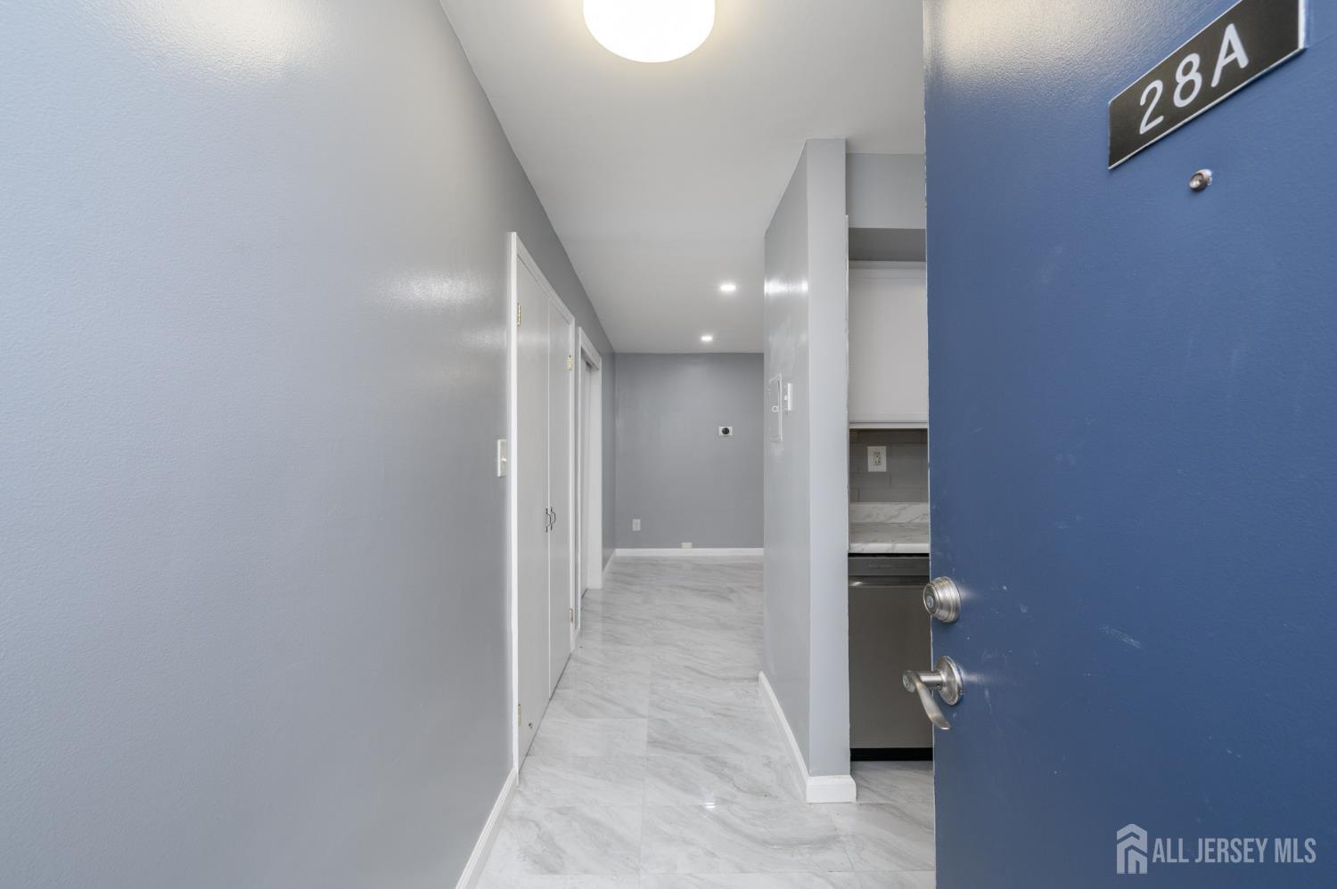 28 Powderhorn Court, Unit A Woodbridge, NJ 07095 - Photo 3 of 26 a view of a hallway