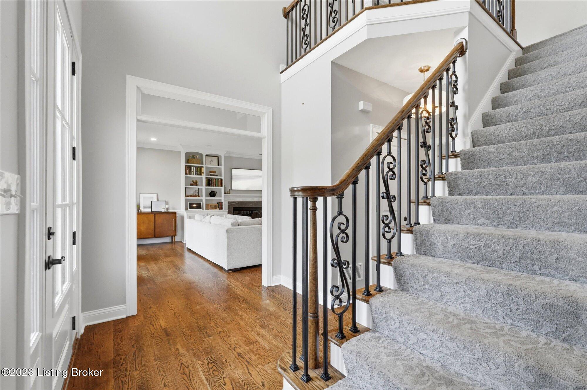5722 Moser Farm Road Prospect, KY 40059 - Photo 3 of 65 The grand foyer showcases impressive ceiling heights and an open staircase.
