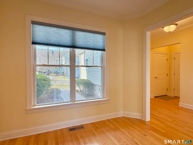 an empty room with window