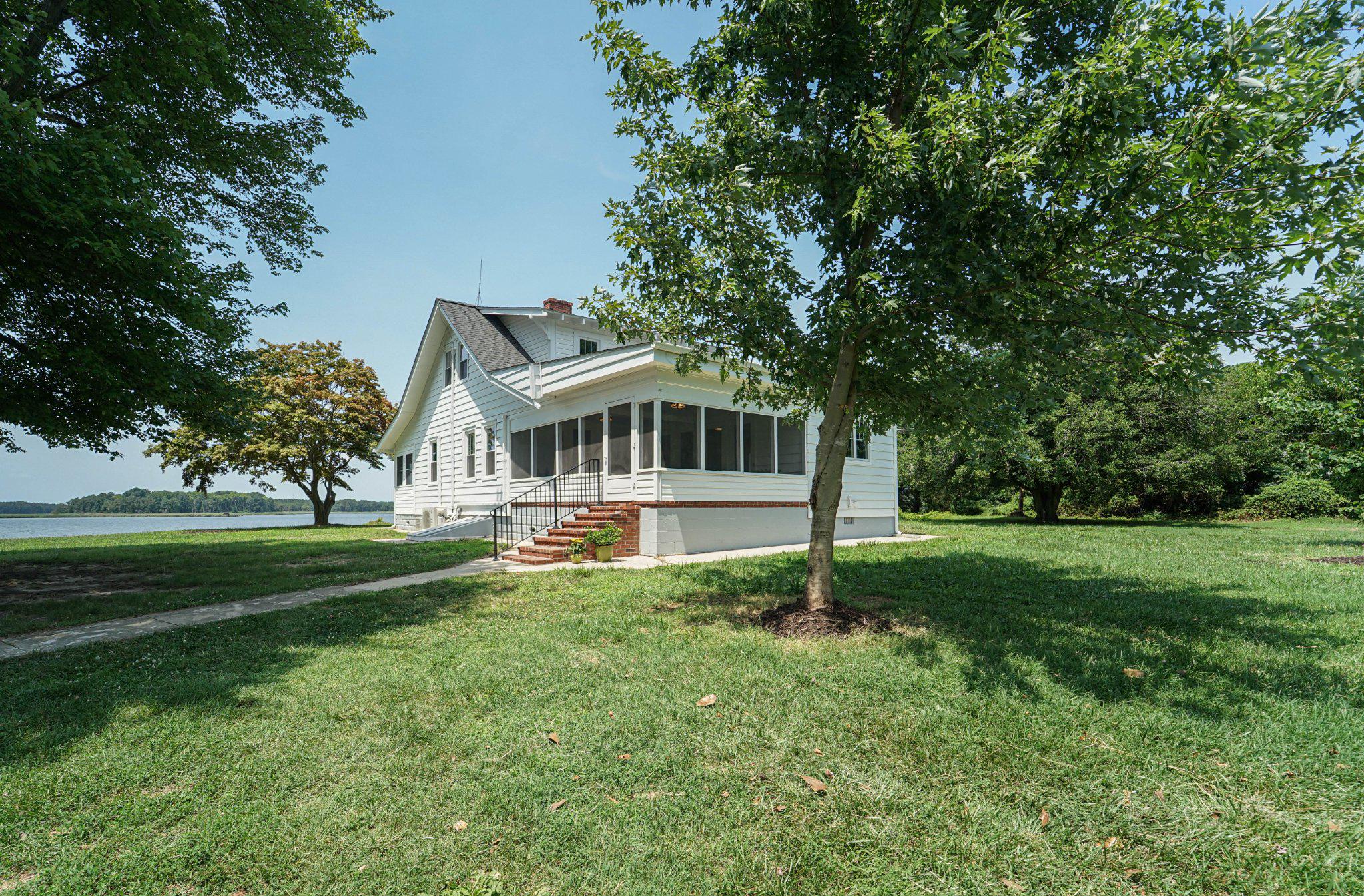 300 Woods Point Road Chester, MD 21619 - Photo 23 of 78 Main house has screened porch with water views
