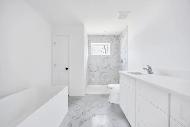 a view of a room with wooden walls