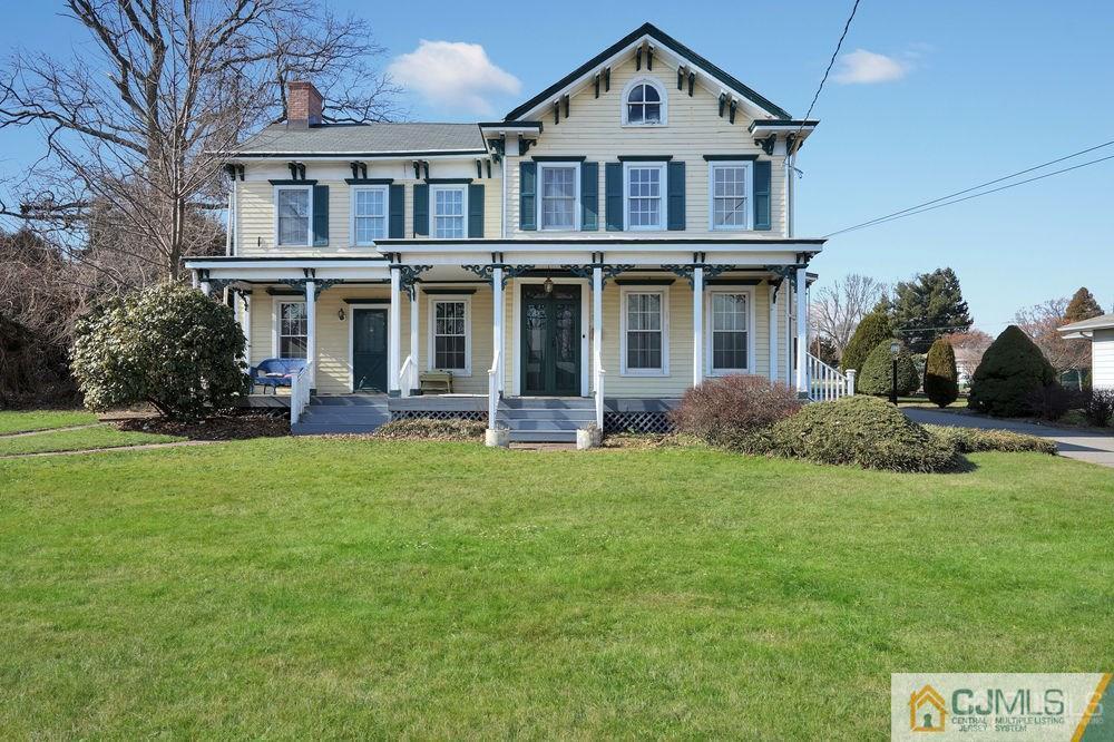 30 Old Post Road Edison, NJ 08817 - Photo 1 of 25 a front view of a house with a yard