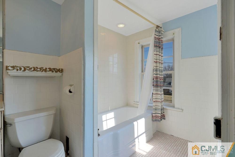 30 Old Post Road Edison, NJ 08817 - Photo 18 of 25 a bathroom with a toilet and a shower