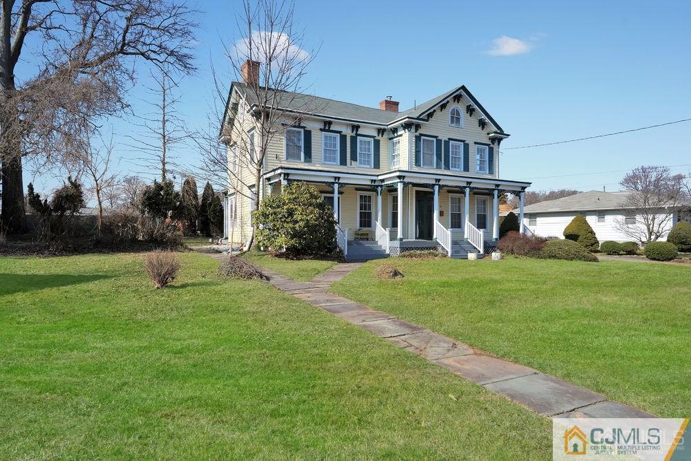 30 Old Post Road Edison, NJ 08817 - Photo 3 of 25 a view of a house with a yard porch and sitting area