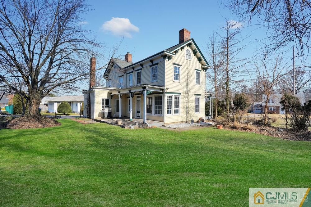 30 Old Post Road Edison, NJ 08817 - Photo 5 of 25 a view of a house with a yard and sitting area