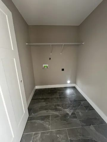 a view of a kitchen with a sink cabinets and a kitchen