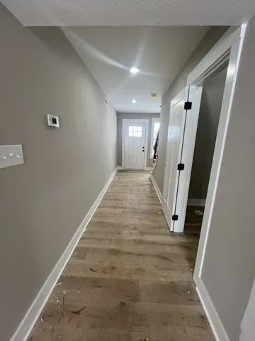 a bathroom with a sink vanity and mirror