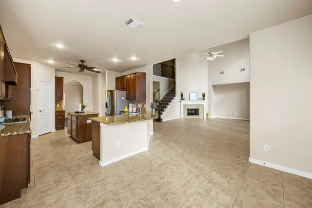 a view of a kitchen with furniture and a counter top space