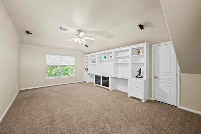 a view of a livingroom with a furniture and fireplace