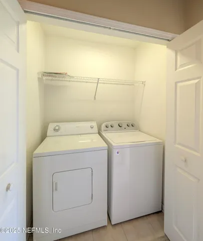 a bathroom with a sink toilet vanity and shower
