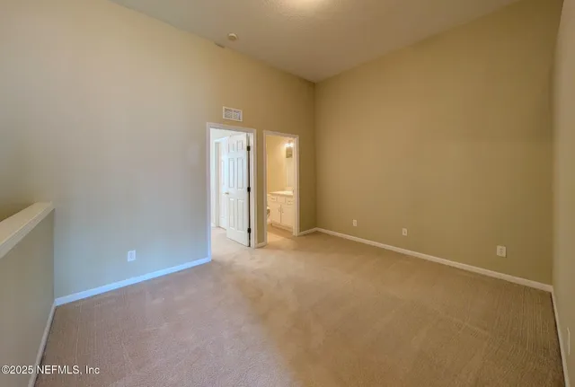 a bathroom with a sink tub vanity and a mirror
