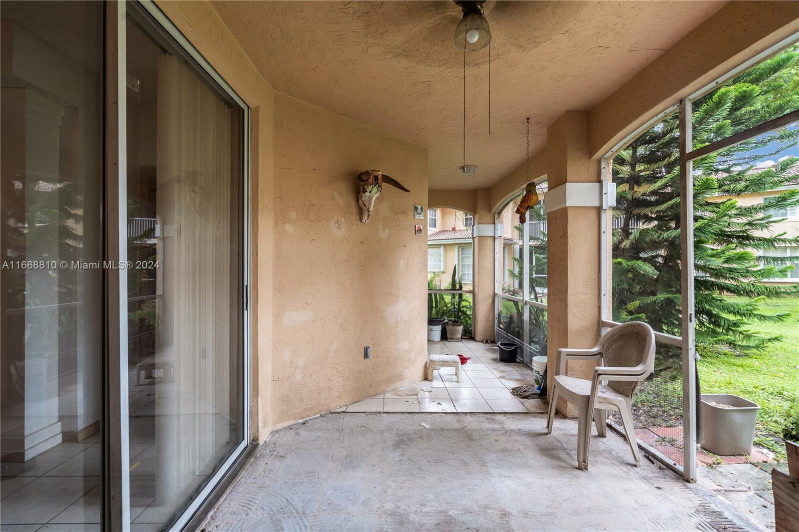 14807 Balgowan Road, Unit 10212 Miami Lakes, FL 33016 - Photo 21 of 32 a living room with furniture