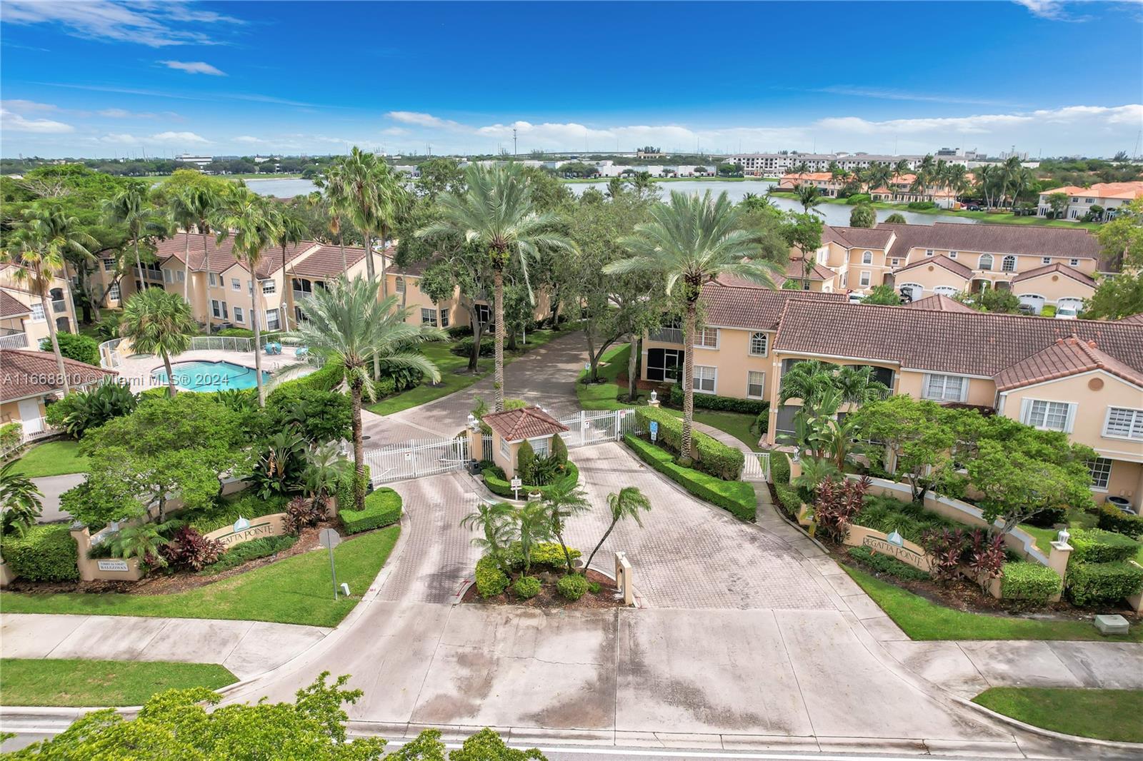 14807 Balgowan Road, Unit 10212 Miami Lakes, FL 33016 - Photo 24 of 32 a view of a city with a building in the background