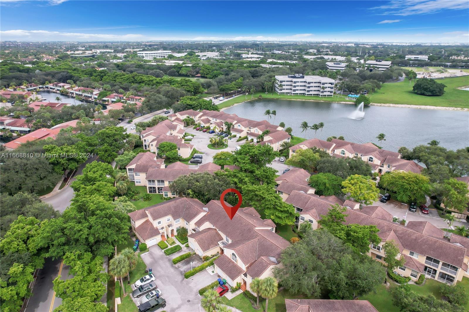 14807 Balgowan Road, Unit 10212 Miami Lakes, FL 33016 - Photo 30 of 32 an aerial view of city and lake