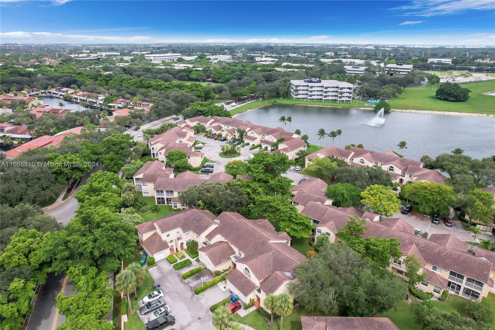 14807 Balgowan Road, Unit 10212 Miami Lakes, FL 33016 - Photo 31 of 32 an aerial view of city and lake