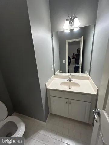 a view of an empty room with stairs